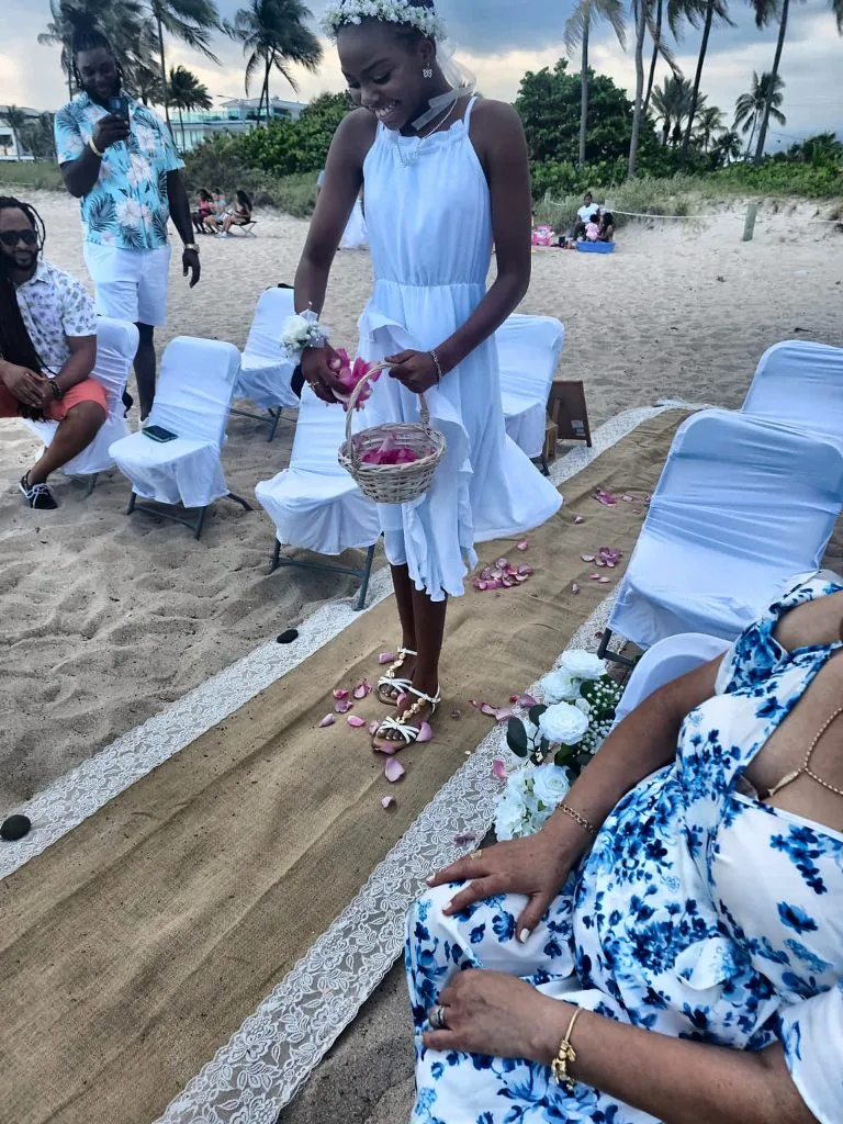 Down the aisle, on the petals